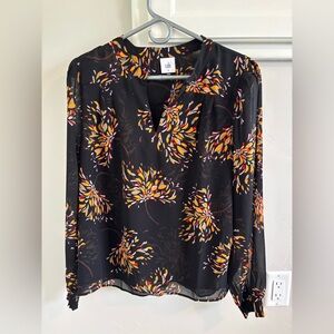 CAbi Black Top with Orange and Yellow Floral Design